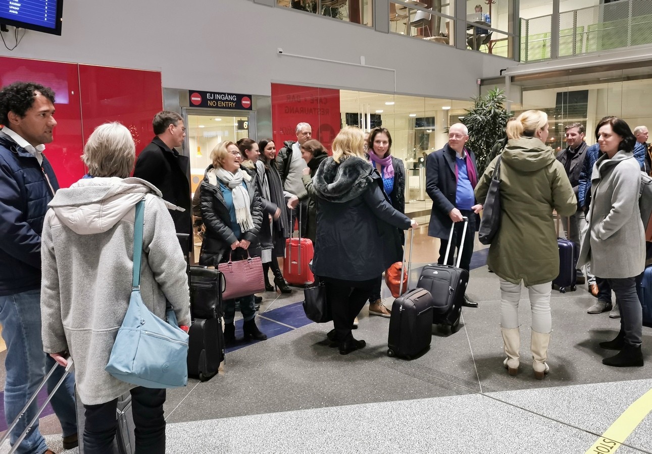 Deelnemers op het vliegveld
